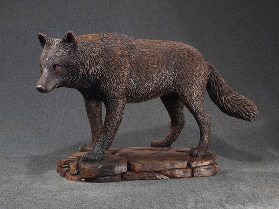 wooden coyote statue