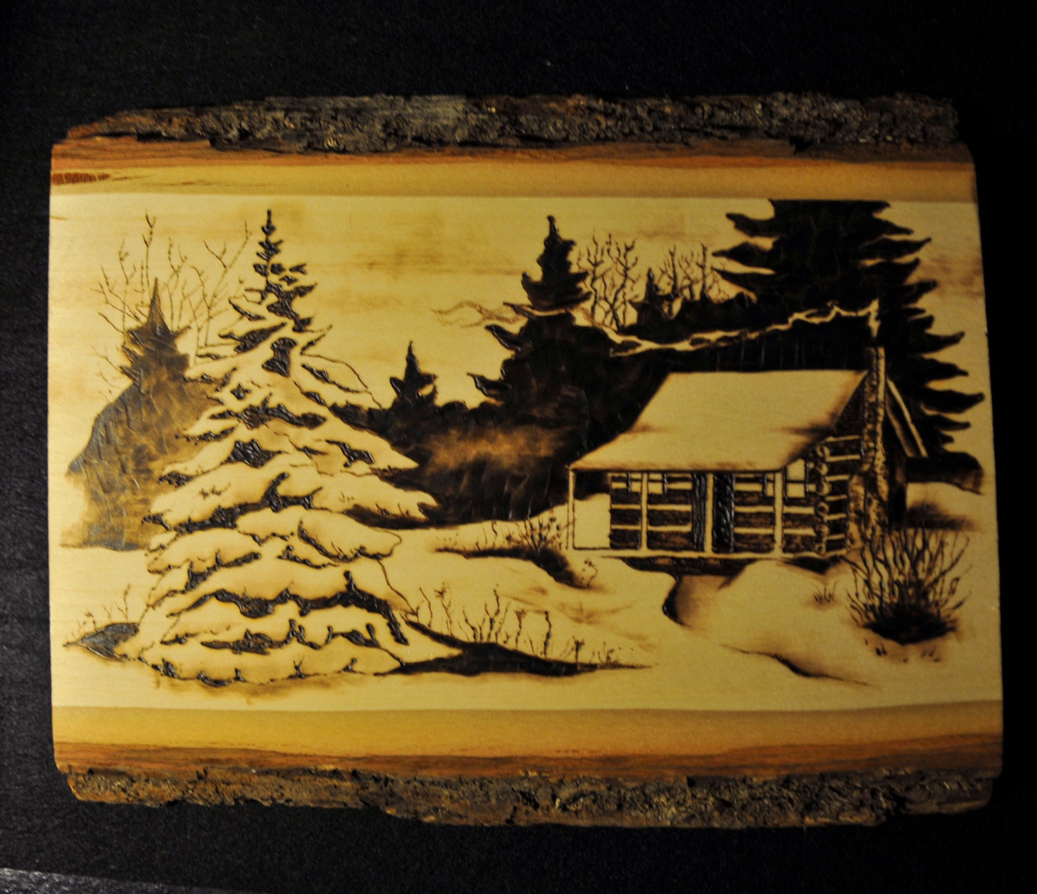 log cabin among the pines wood burned by theartsoftimeandlife