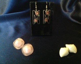 Seven pair of pierced earrings
