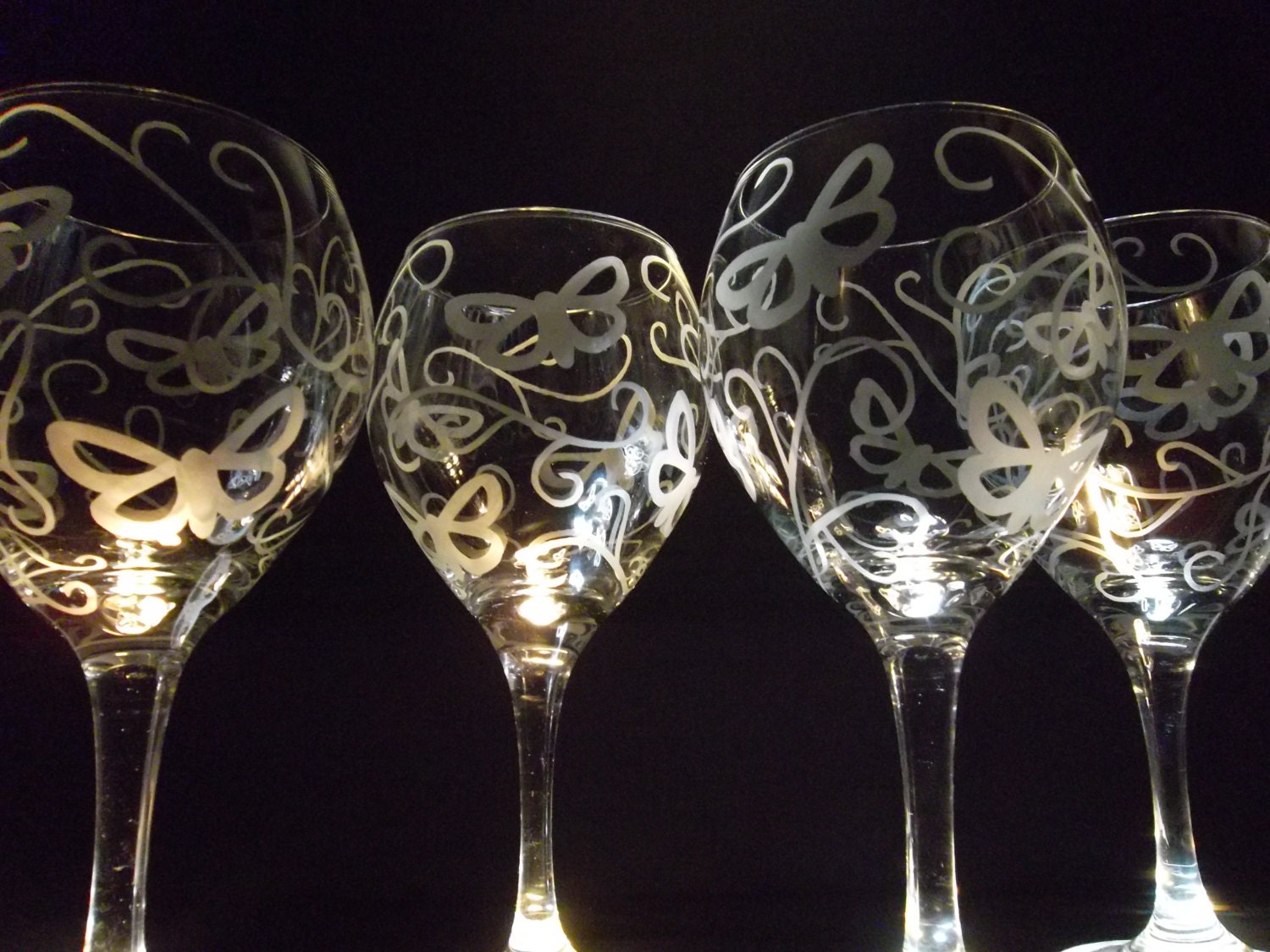 Etched wine glasses with butterfly and swirl/scroll. Set of 4.