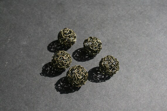 Bronze tone Hollow Twist Ball wire beads x 5. by JewellerySmith steampunk buy now online