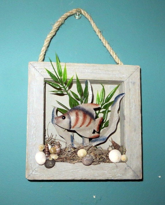 Items similar to Metal fish frame Beach decor with shells on Etsy