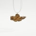 Juniper no 3. natural art. unique deformed wooden pendant on grey string. wooden jewelry. wooden necklace.