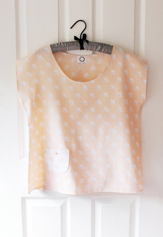 Soft Peach Oversized Tunic Top with allover bird print and