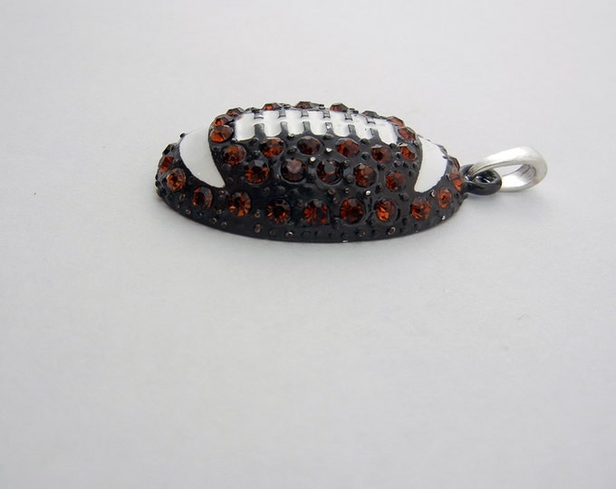 Black and White Epoxy Topaz Rhinestone Football Pendant SIlver-tone Base