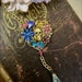 Fiesta de los Muertos: Day of the Dead Rosary Necklace Skull in Rhinestone Floral Heart Vintage Assemblage