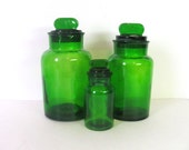 Vintage set of 3 green glass canisters