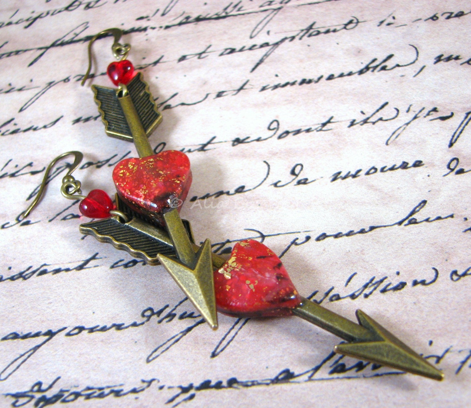 Lovestruck. Heart and arrow earrings. Polymer clay and
