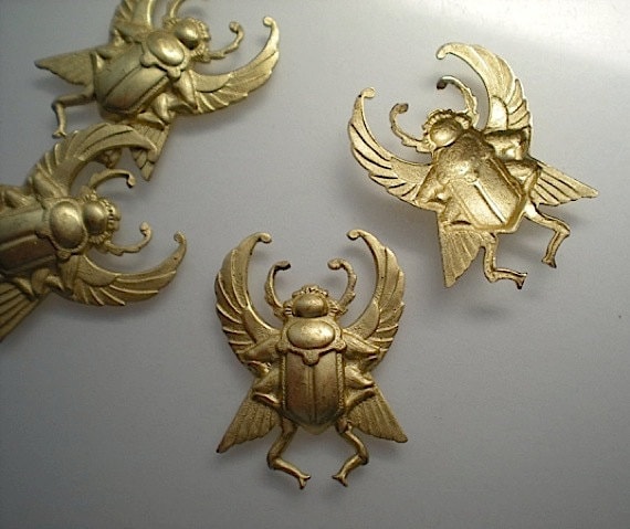 4 stylized beetle charms