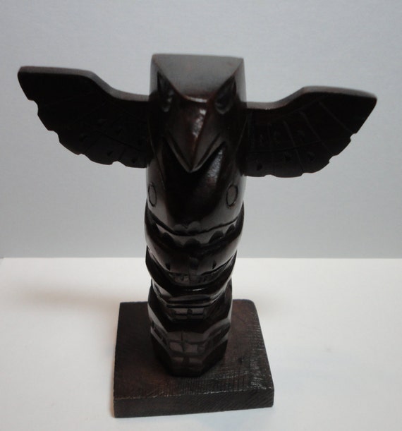 Eagle Totem Pole. Native American. Wood carving