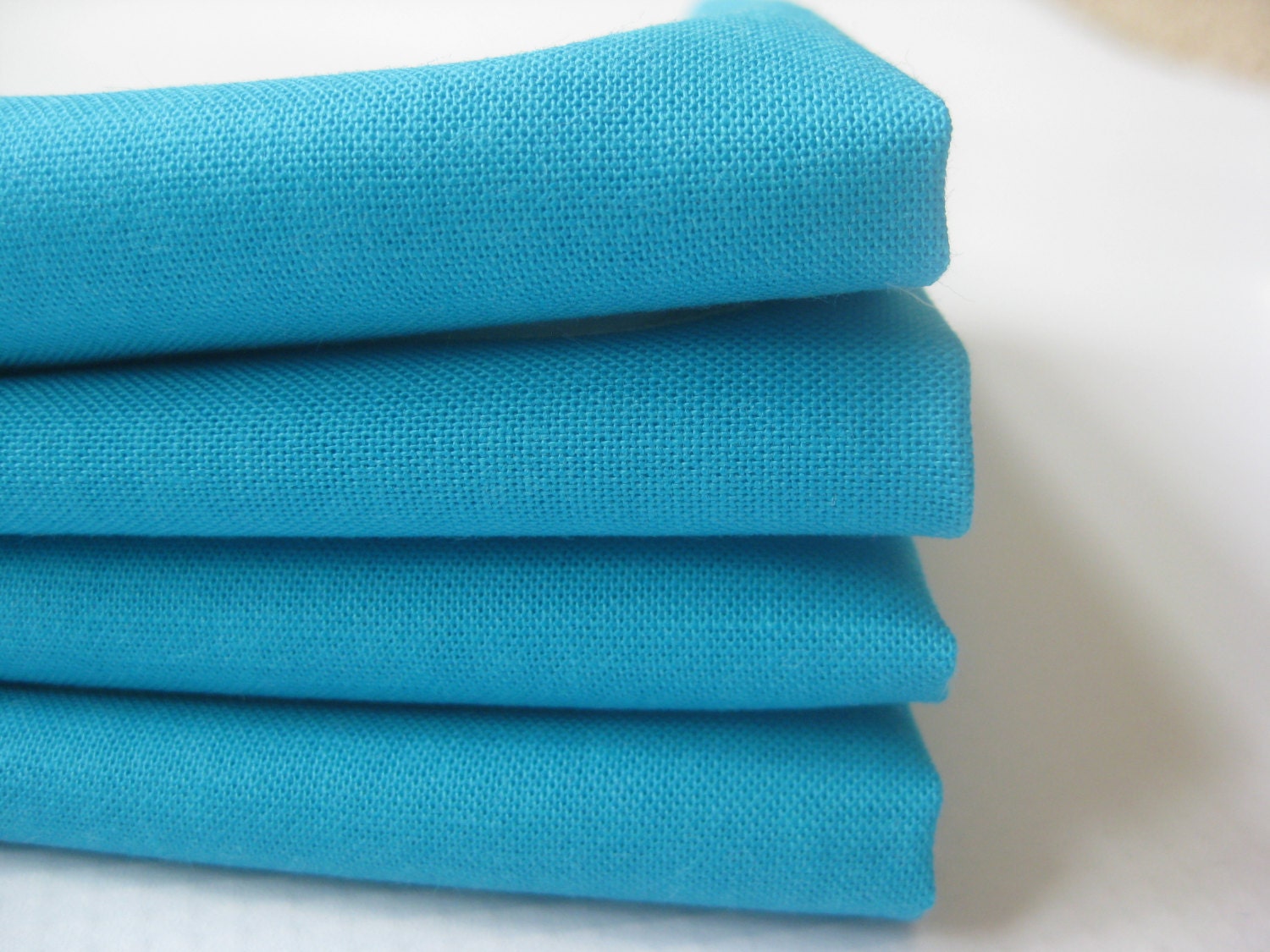 Sizing Your Needs – The Right Table Cloth, for The Right Table ʺW × 32ʺD × ʺH Set of twelve teal French hand-embroidered napkins. Large, dinner size in patterned damask. Newly hand-dyed with organic vegetable dye in Provence. Dyed in small batches, rinsed with lavender water, starched and ironed.