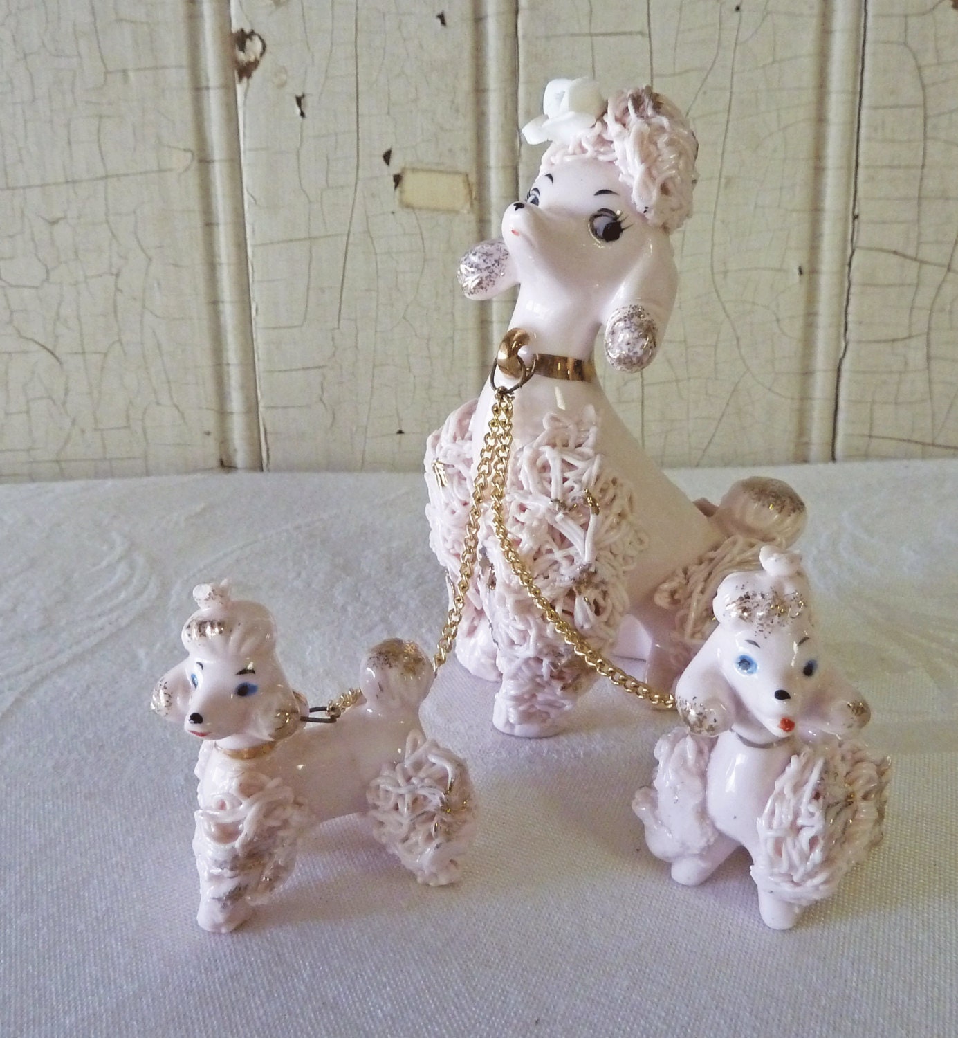 vintage pink porcelain poodles