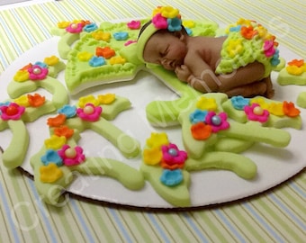 April Showers Bring May Flowers Fondant Cake and Cupcake Set baby girl or boy with flowers and umbrellas made of vanilla fondant