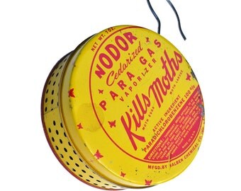 vintage tin moth vaporizer with hanger offered by Elizabeth Rosen