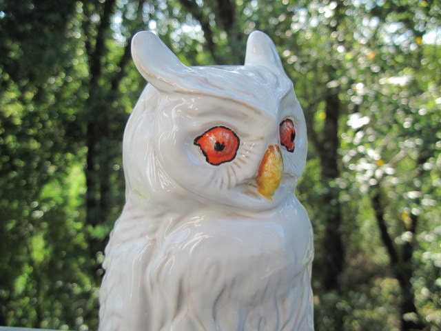 white ceramic owl figurine