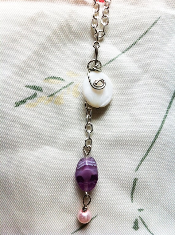 serena. a simple silver bead pendant necklace.