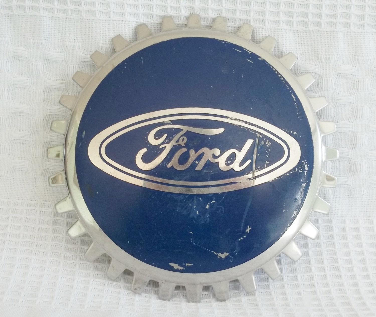 Vintage blue and chrome metal Ford grill cover emblem logo