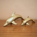 Vintage pair of large brass dolphins, Hollywood Regency, mid century modern, beach decor