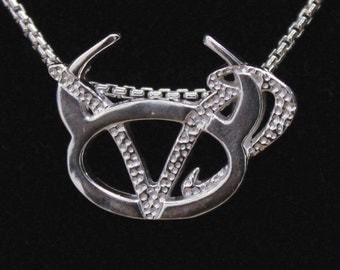 21 Taurus and Capricorn Silver Unity Pendant