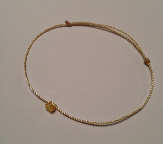 Thin string bracelet