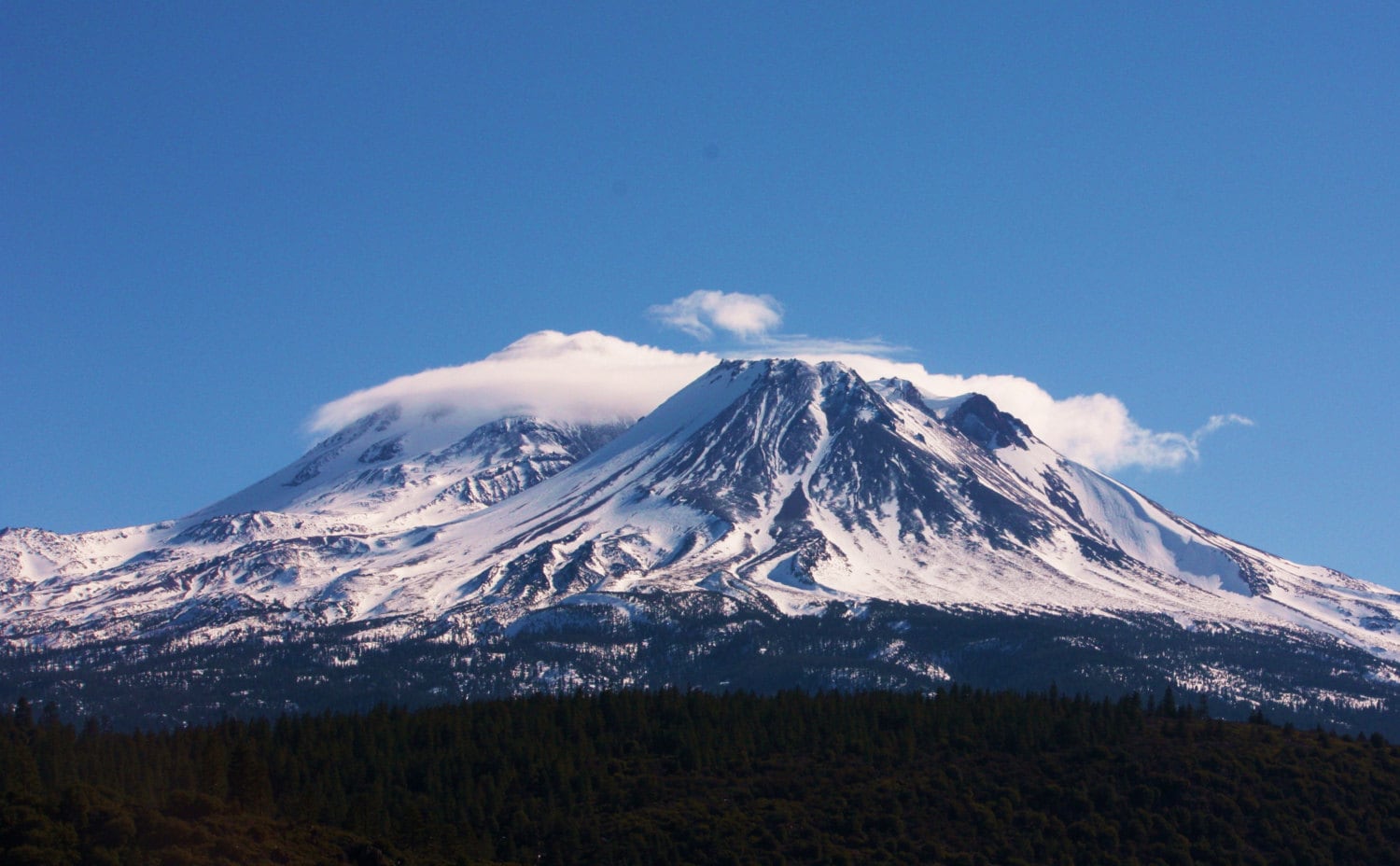 Snow covered Mt. Shasta volcano in Cascade by InspiredShots