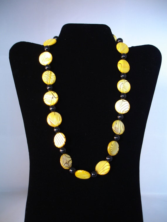 Items similar to Yellow and Black Shell Necklace Iowa Hawkeye