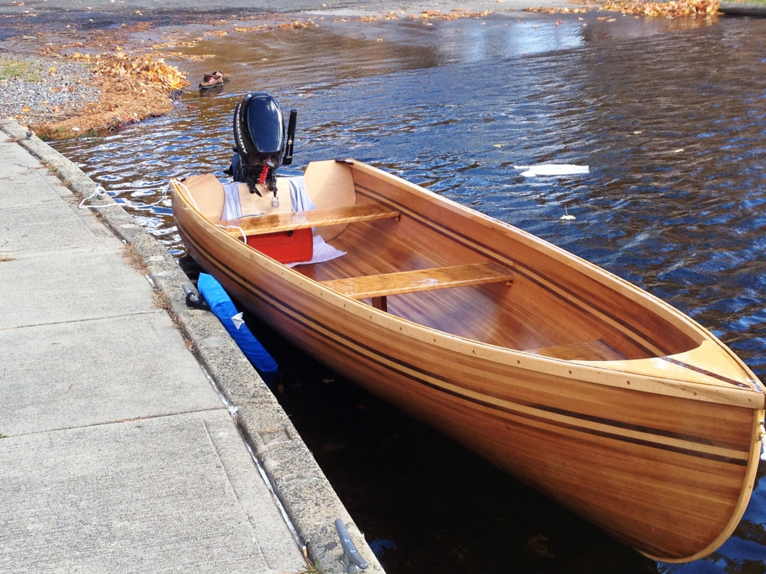 hand built cedar strip wooden boat.