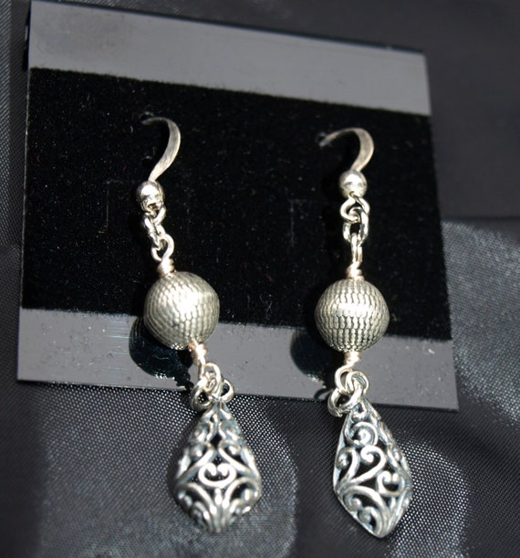 Items similar to Silver Bali Earrings on Etsy