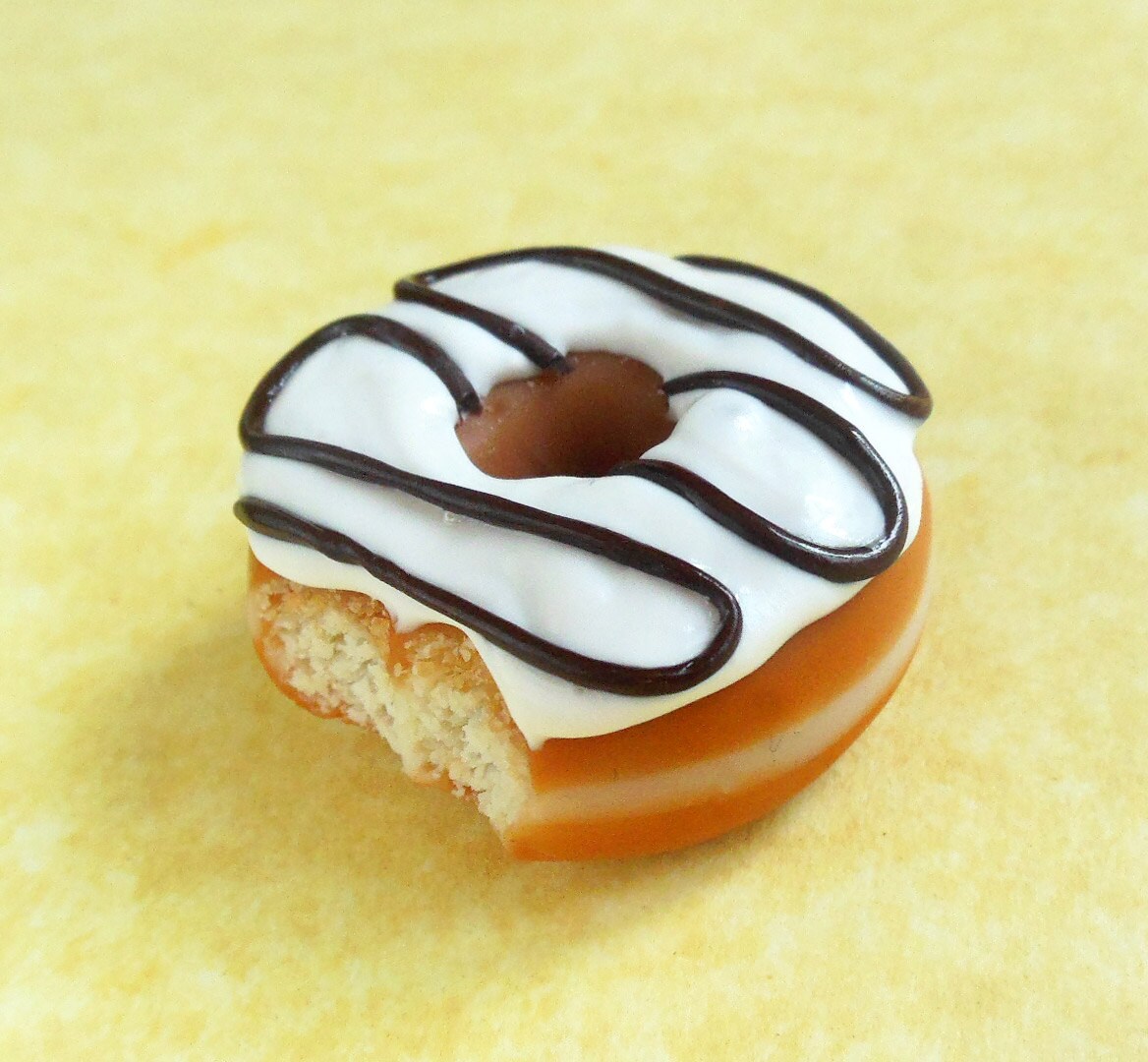 chocolate drizzle polymer clay doughnut by ScrumptiousDoodle
