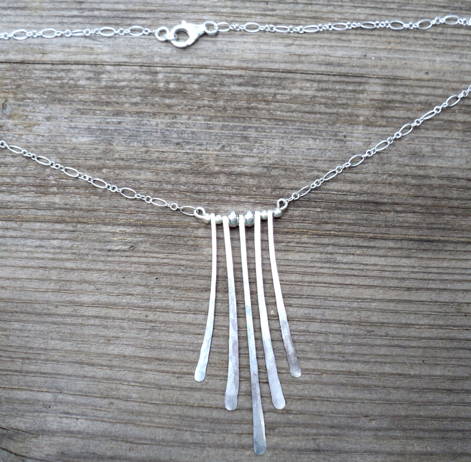 Hammered sterling silver fan necklace with five long