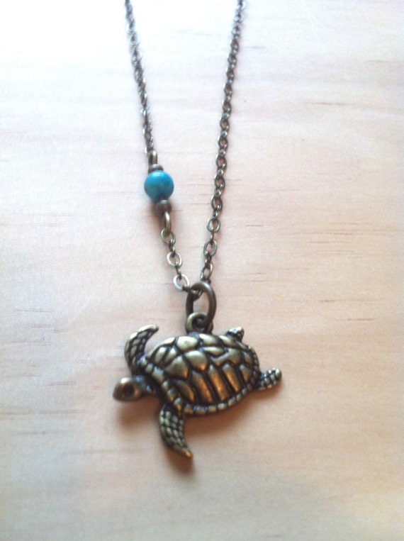 Items similar to Swimming Sea Turtle Necklace on Etsy