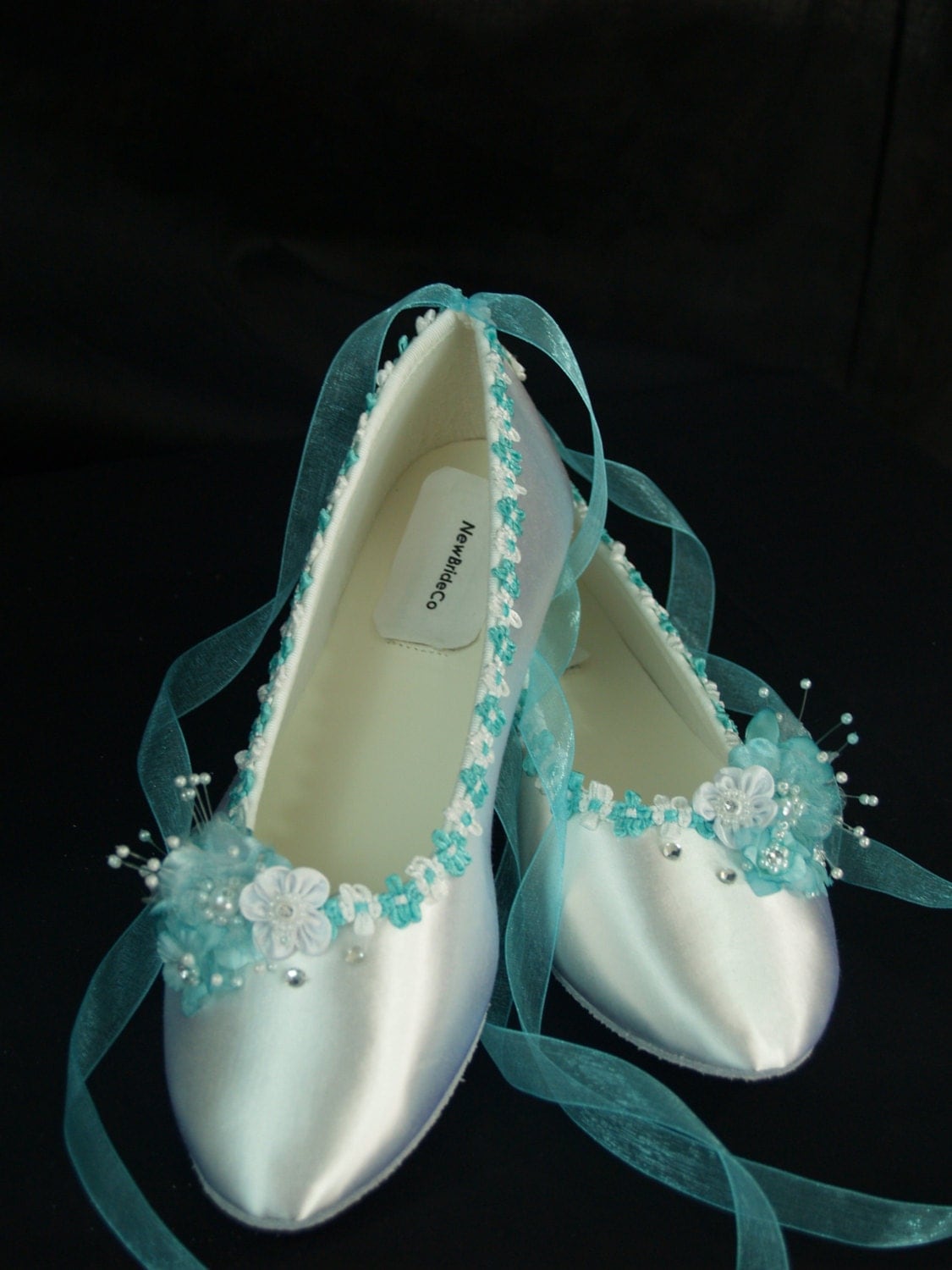 Slipper wedding shoes Find the perfect wedding slippers to sparkle on your big day! Choose from David's Bridal beaded and sparkly bridal slippers for getting ready or after the wedding.