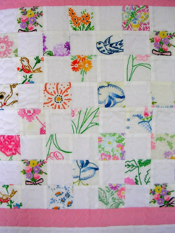 Baby quilt from pieces of vintage embroidery Baby quilt from pieces of vintage embroidery