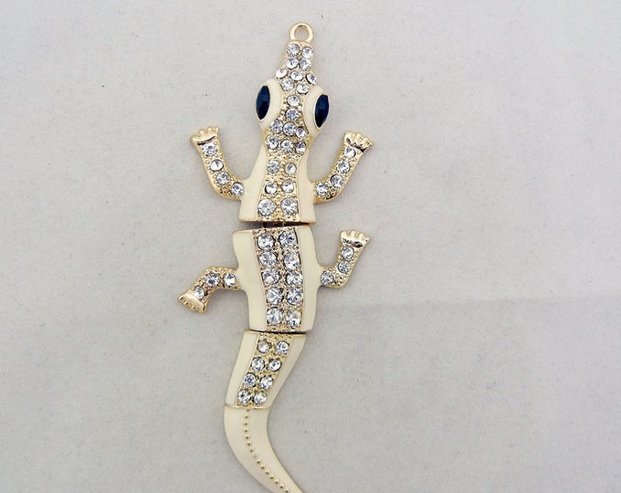 Gold-tone Flexible Alligator Pendant with Rhinestones and Creme Epoxy