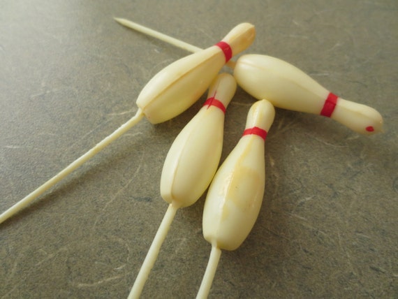 small plastic bowling pins