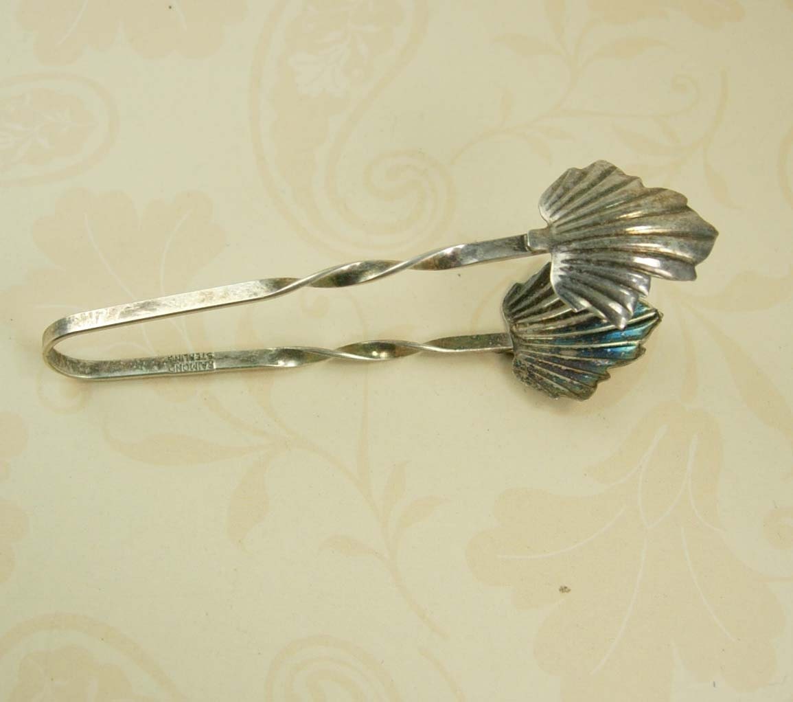 Antique sterling FIgural twisted arm sugar tong Raimond