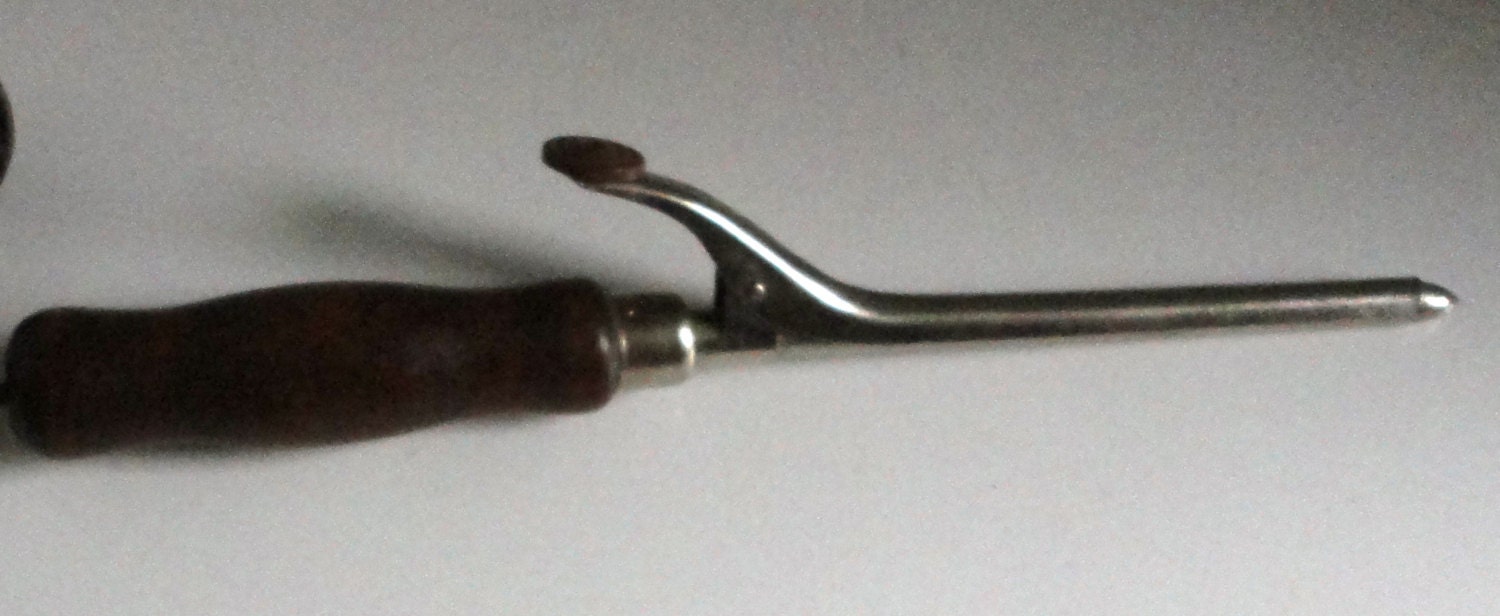 Vintage electric curling iron made in U.S.A