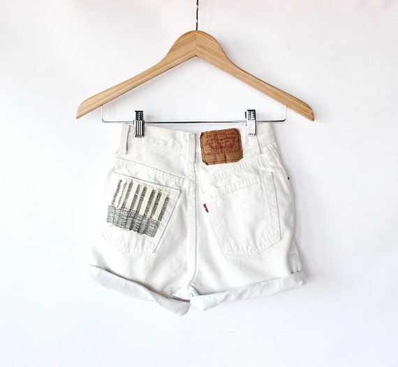 white levi cut off shorts