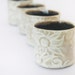 Shot cups or sake cups - set of 4 in Australian flannel flower design.