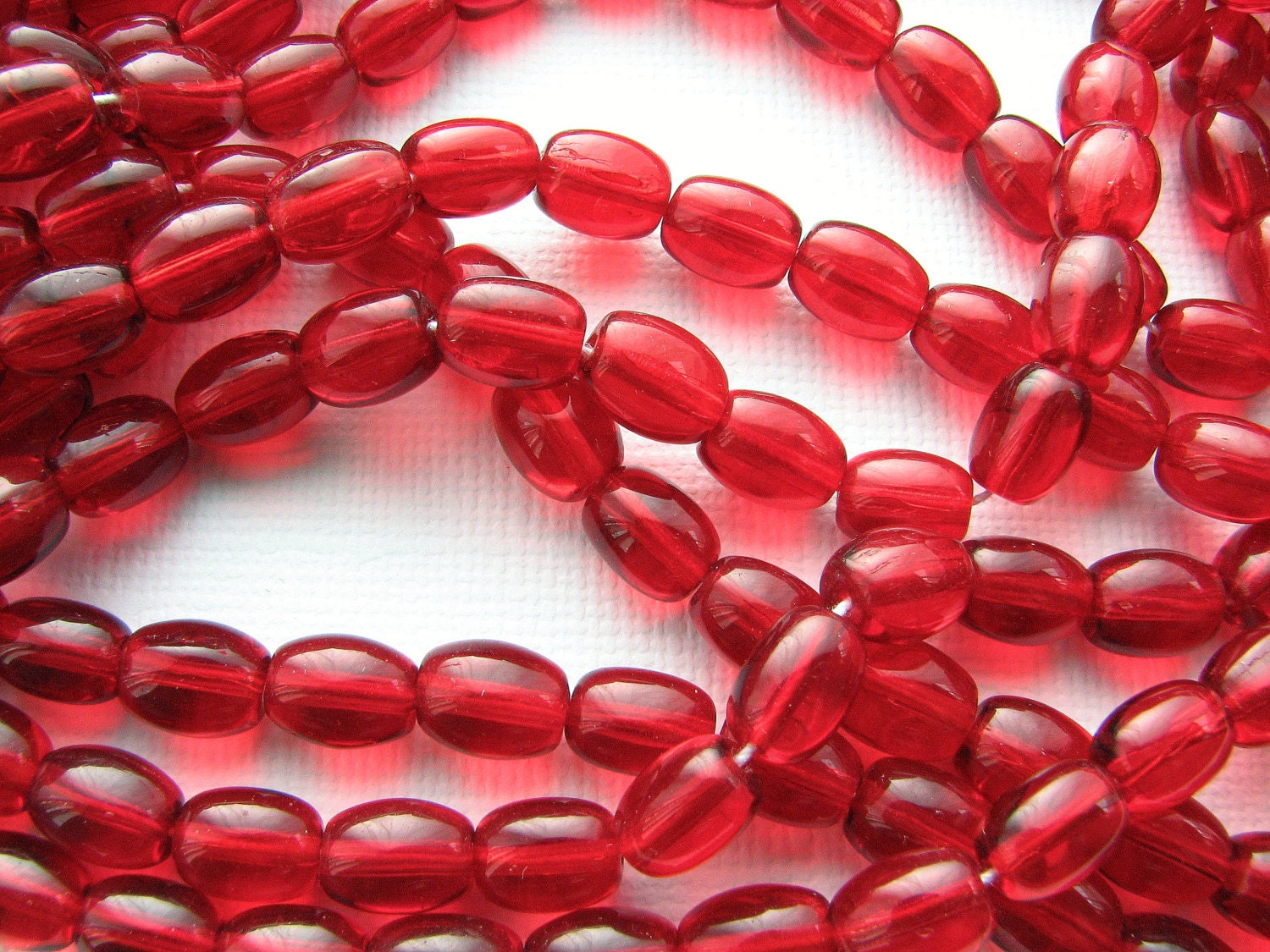 red glass barrel beads 7x9mm qty 25 translucent clear red