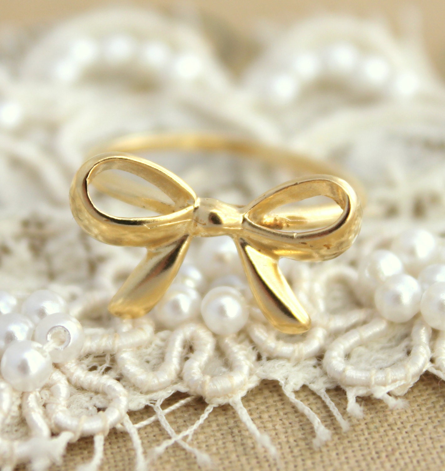 Gold bow ring 14 k goldfield