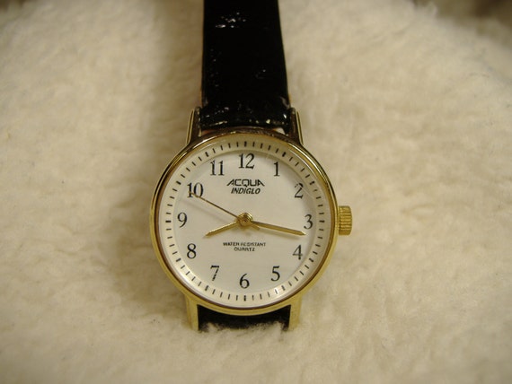 acqua indiglo watch
