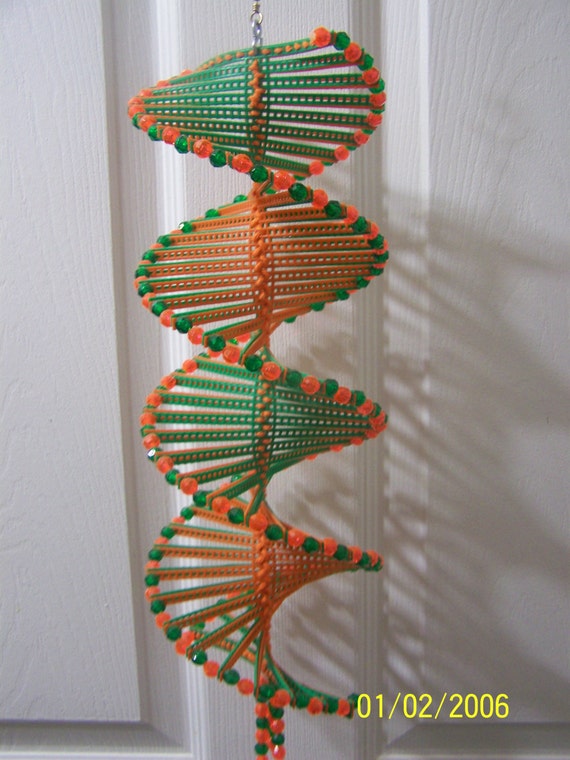 Items similar to Wind Spinner made with plastic canvas and beads on Etsy