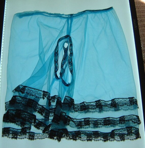 sheer turquoise nylon lace crotchless tap panties