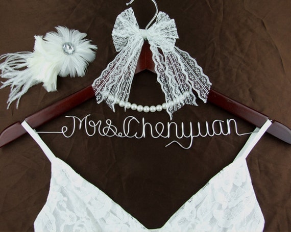 Dress holder | Lace bows, Dress holder, Inexpensive wedding venues