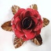 Large Metal Hand Cut and Hand Painted Rustic Red Rose Mounted on a Bed of Metal Leaves.