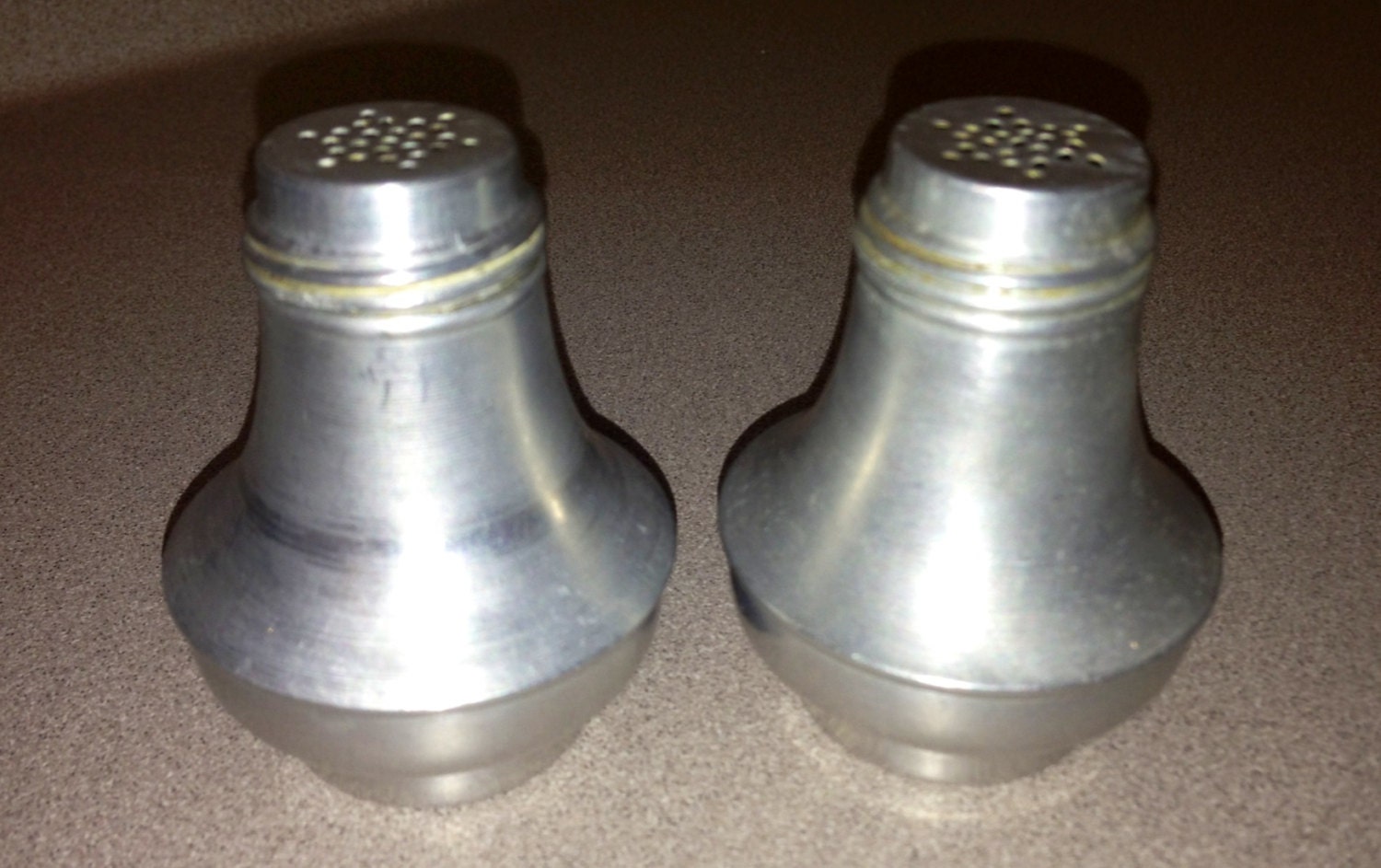 Aluminum salt and pepper shakers Haute Juice