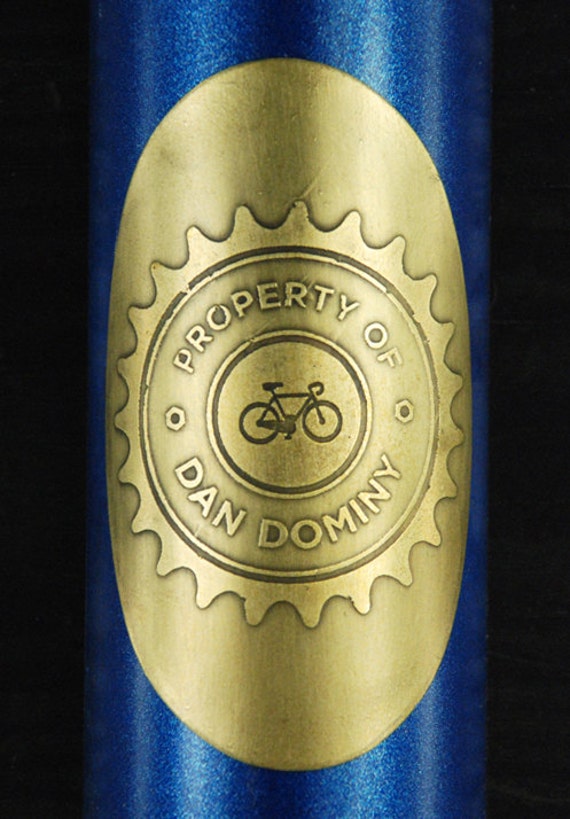 Items similar to Custom bicycle head badge, "Property Of......." on Etsy