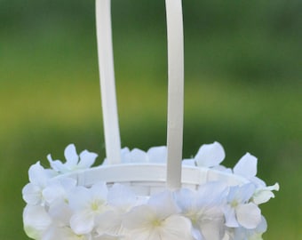 Wedding Flowers, White hydrangea flower girl basket.