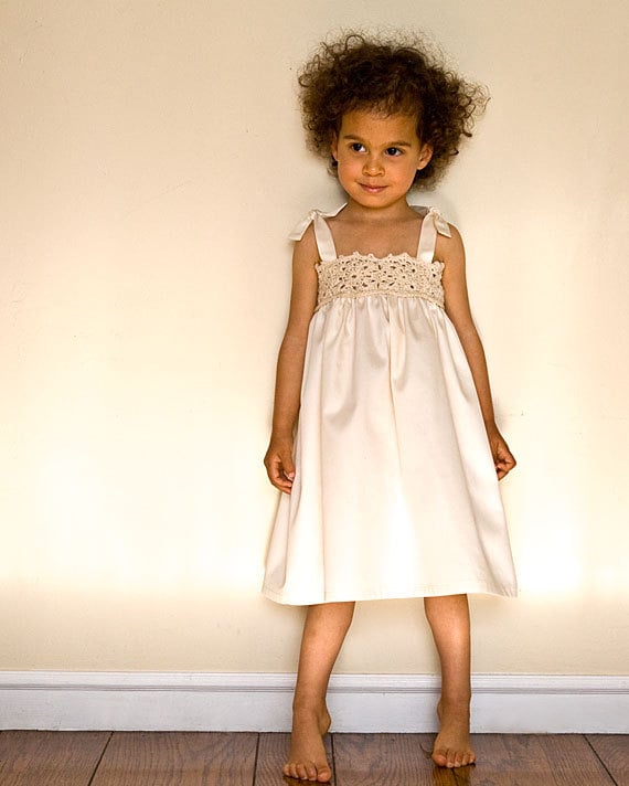 Lace flower girl dress in white or ivory for beach wedding.